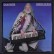 LP EDGAR WINTER STANDING ON ROCK